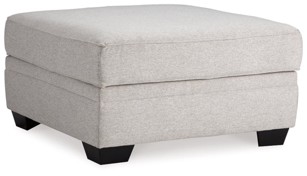 Dellara 4-Piece Sectional with Ottoman - PKG001116