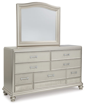 Coralayne Queen Upholstered Bed with Mirrored Dresser, Chest and 2 Nightstands - PKG007776