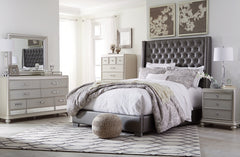 Coralayne California King Upholstered Bed with Mirrored Dresser, Chest and Nightstand - PKG007830